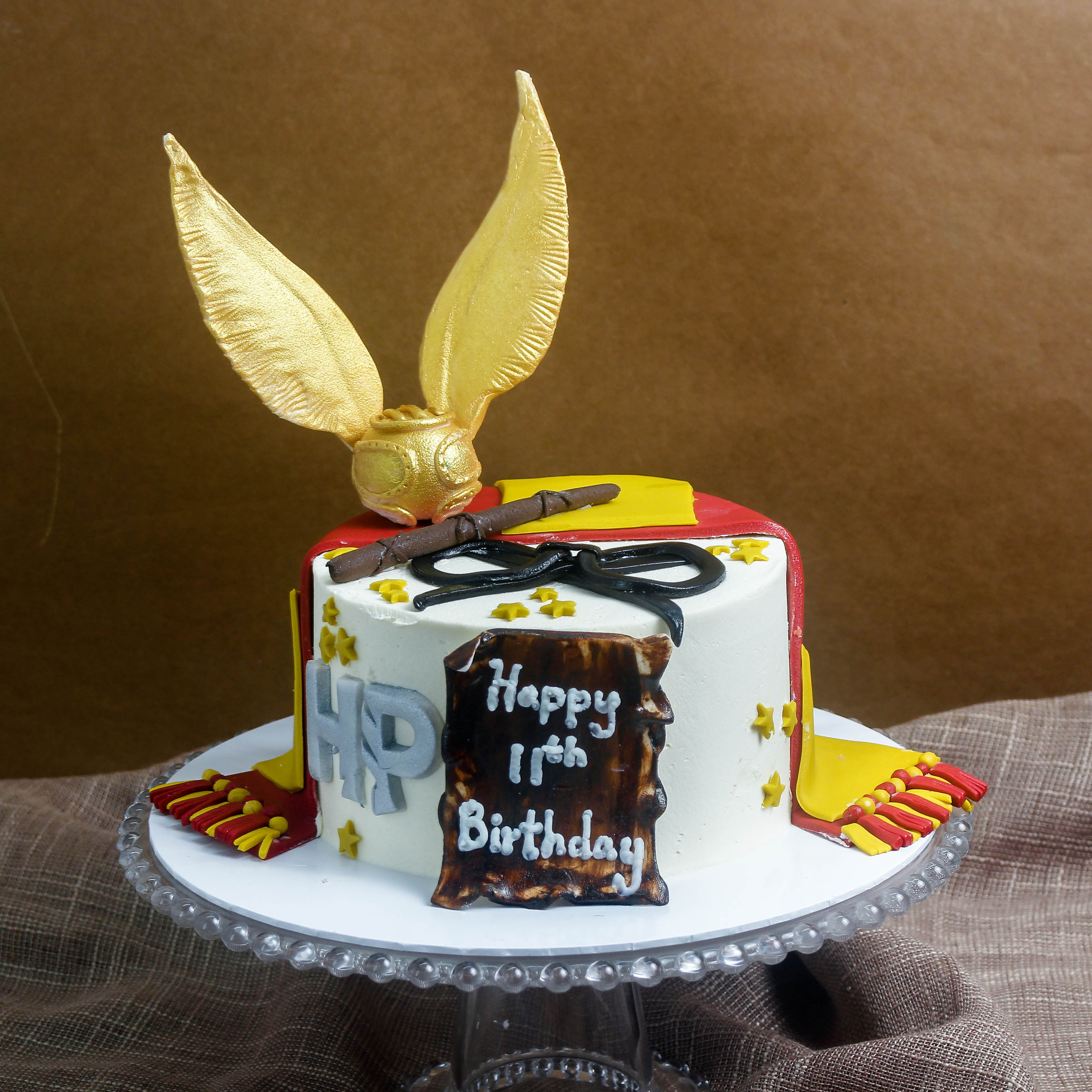 Wizard Themed Birthday Cake with Golden Wings 1.3Kg